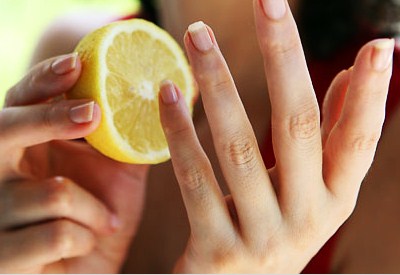 Putting lemon on nails