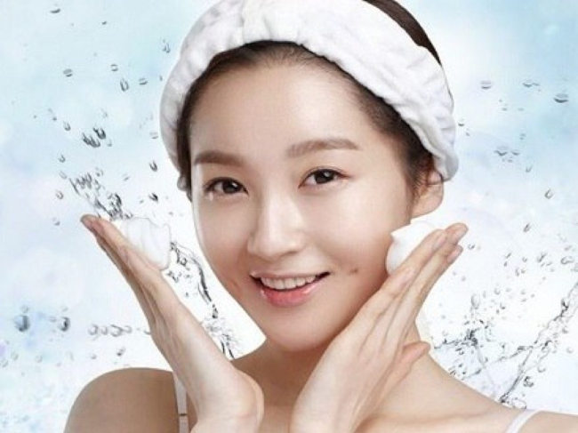 Korean woman double cleansing face