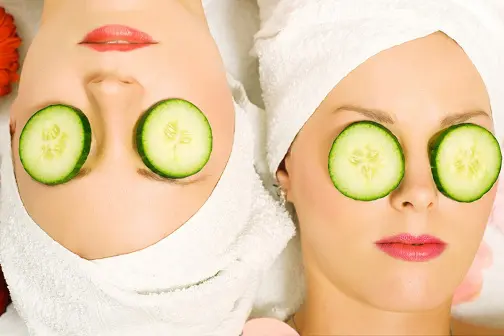 Cucumber slices on face